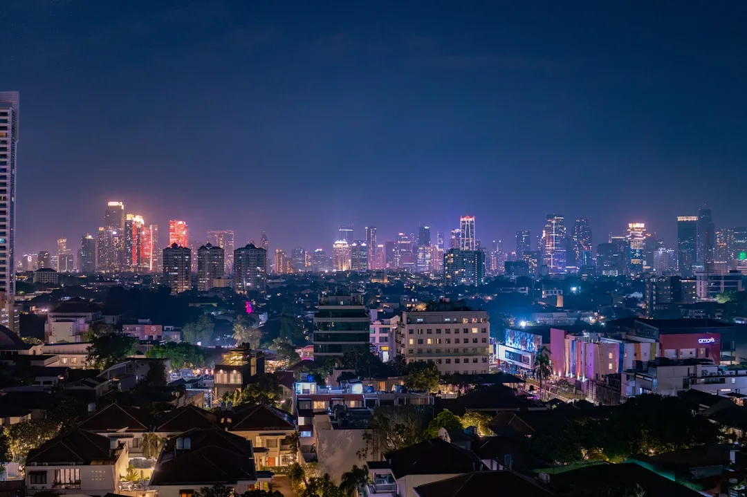 Fastest IDN live draw - Nusantara Pools 4D, Jakarta skyline at night in Indonesia, synthetic community aggregator
