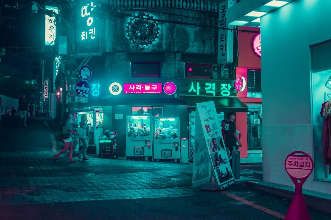 Afternoon KOR 4D live draw schedule - neon street at night in Gangnam, Seoul, daily at 14:30 WIB