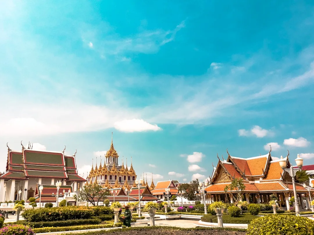 THA draw schedule 2× a month - orange temple of Bangkok's Grand Palace, Thailand, GLO Government Lottery Office